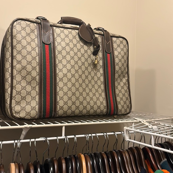 Gucci Handbags - Brand new Gucci monogram suitcase.
